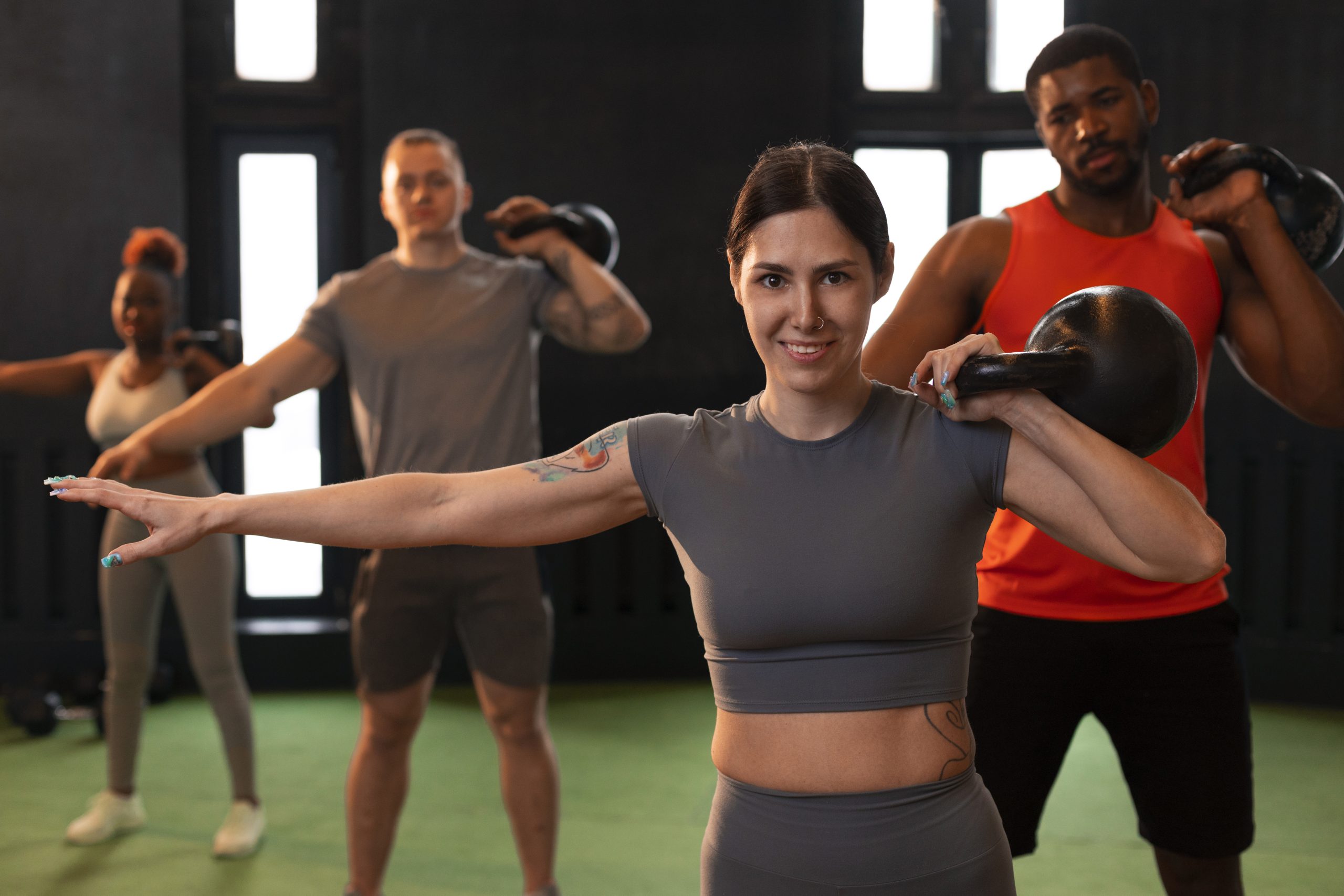 front-view-people-training-together-gym